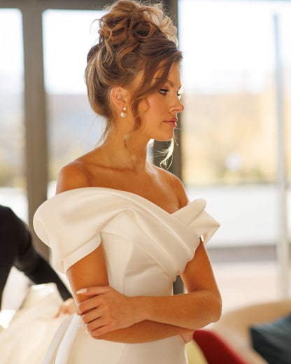Mermaid Mikado wedding dress with fishtail train and bow.