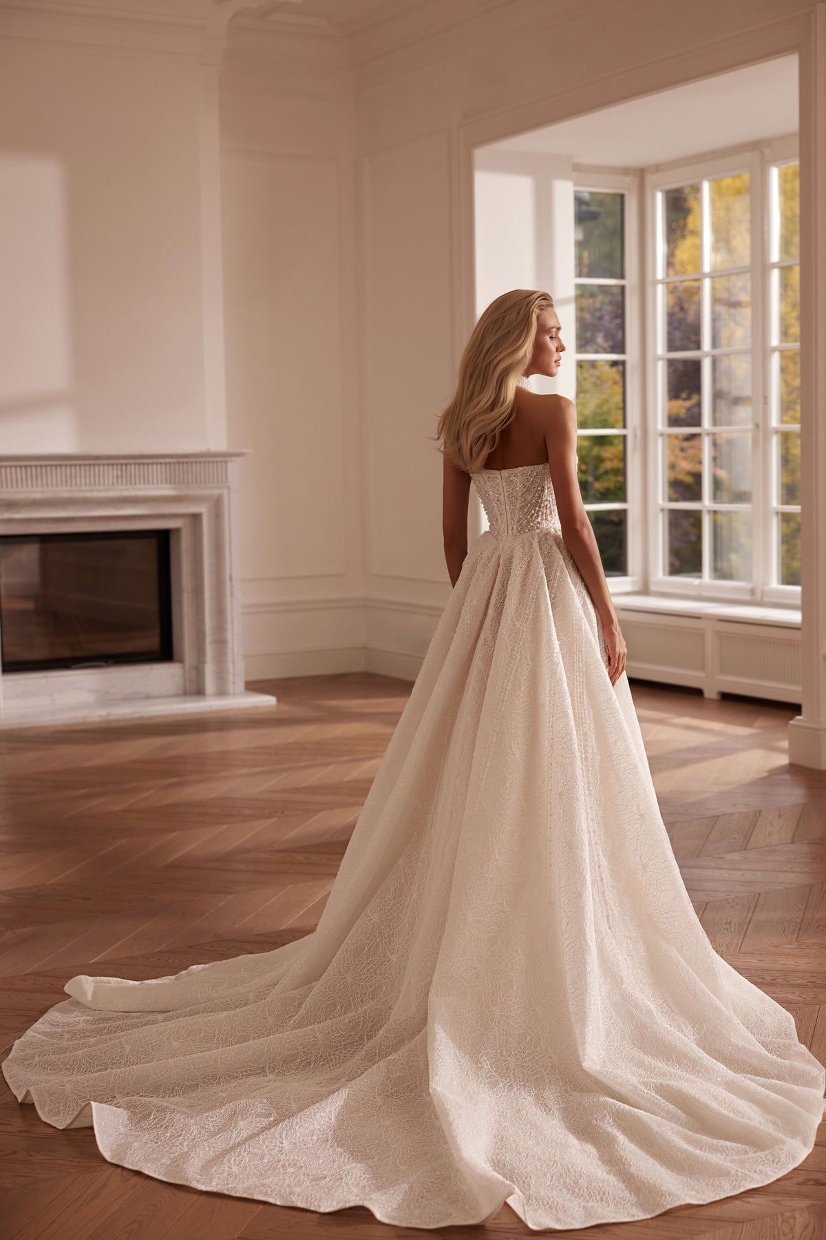 A-line wedding dress with beaded corset bodice and sparkling tulle skirt - side view