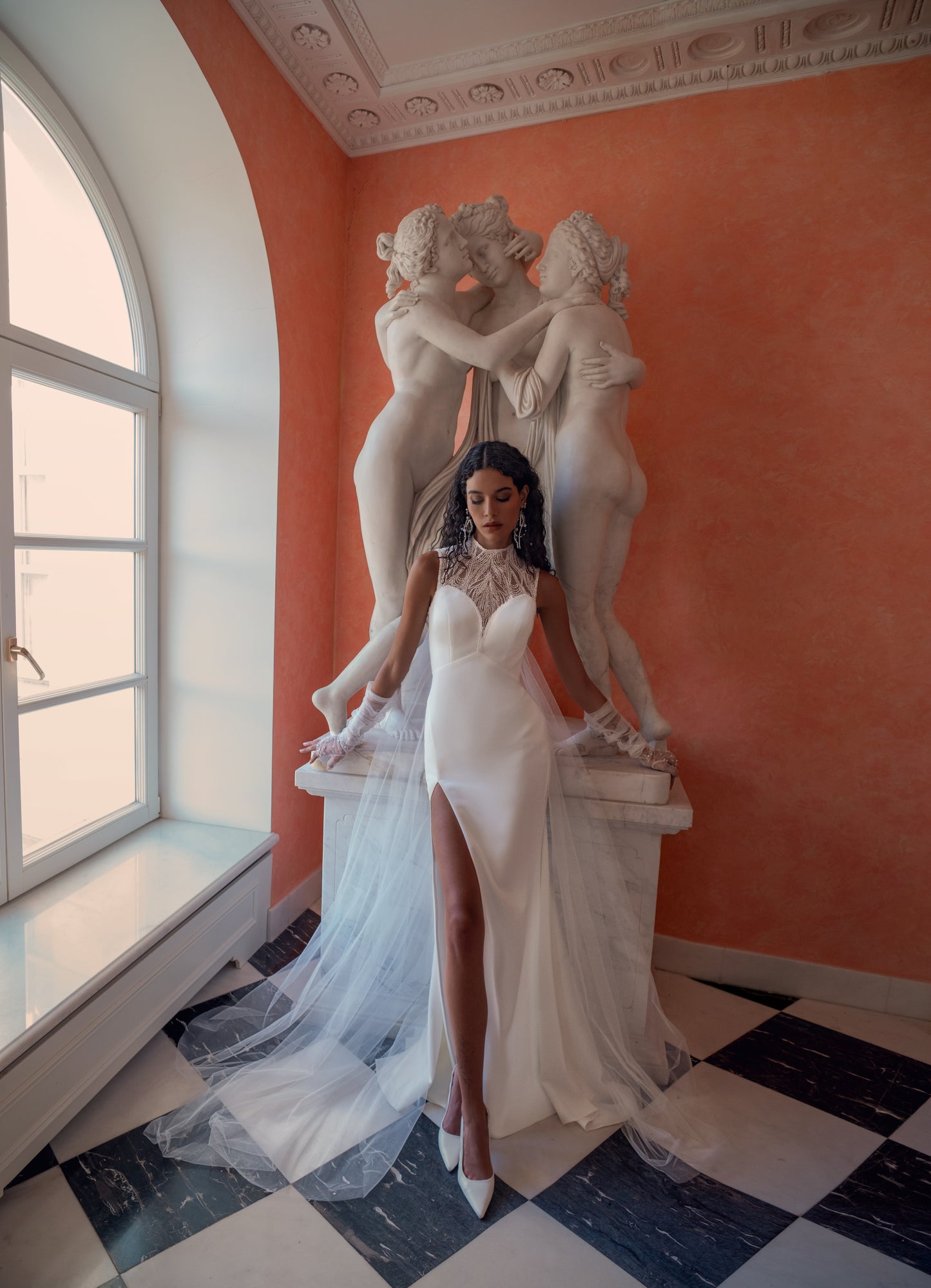 high neck crepe wedding dress with illusion beaded bodice, open back and detachable cape