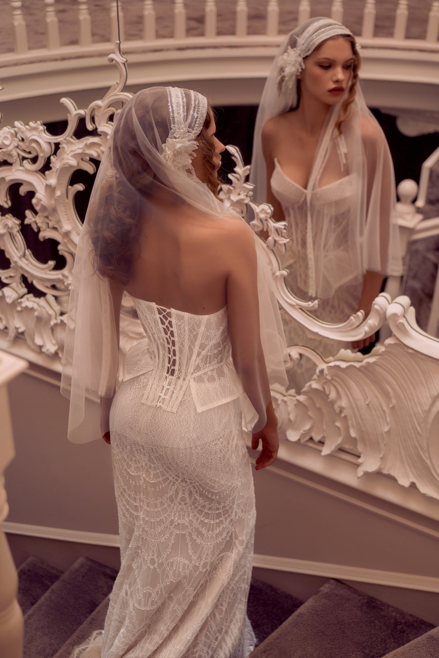 Lace strapless corset wedding gown with basque waist and mermaid-inspired silhouette