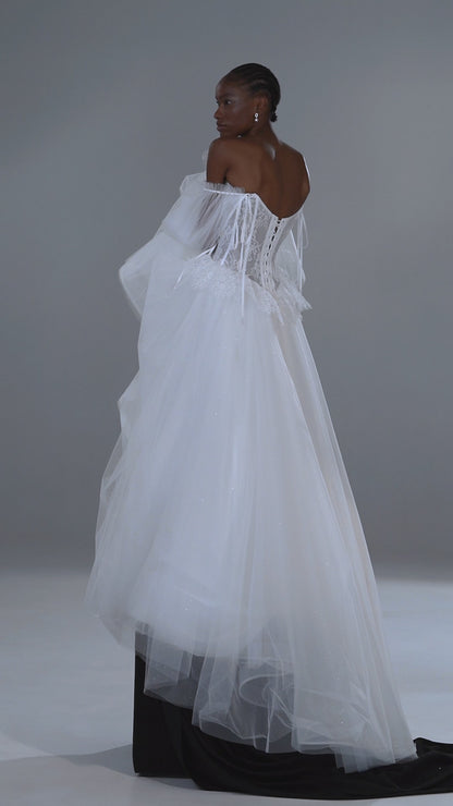 Lace and tulle ball gown wedding dress with corset bodice and peplum waist – video