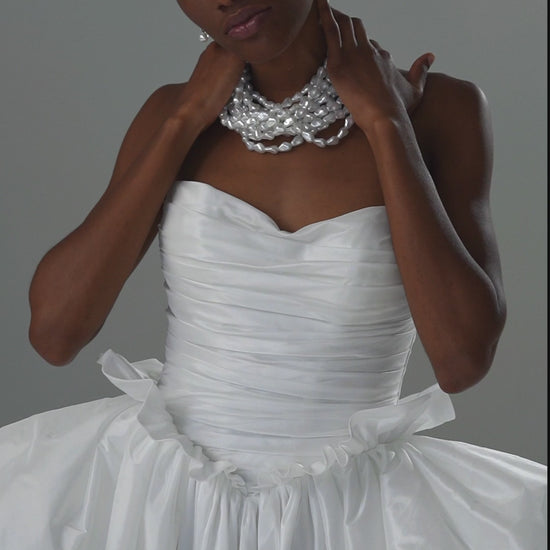Taffeta ball gown wedding dress with strapless ruched bodice and oversized bow – video