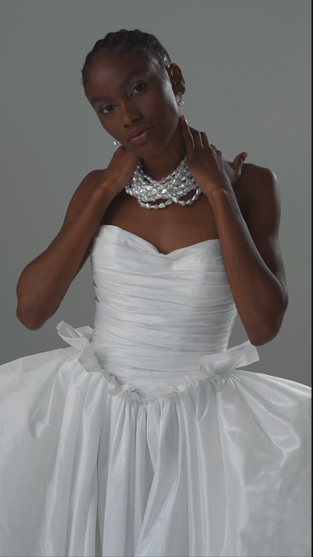 Taffeta ball gown wedding dress with strapless ruched bodice and oversized bow – video