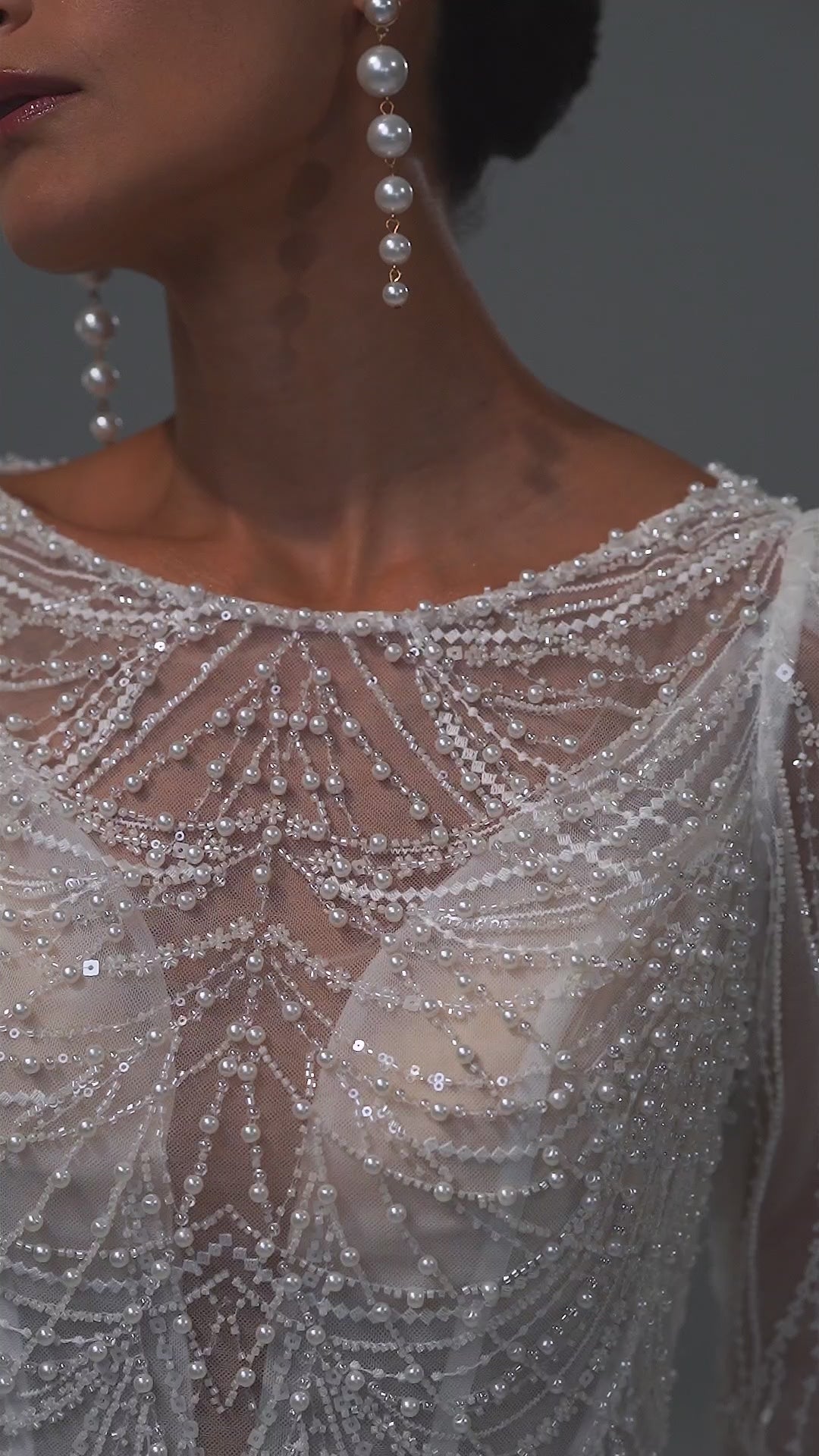 Beaded lace sheath wedding dress with illusion neckline and long sleeves – video