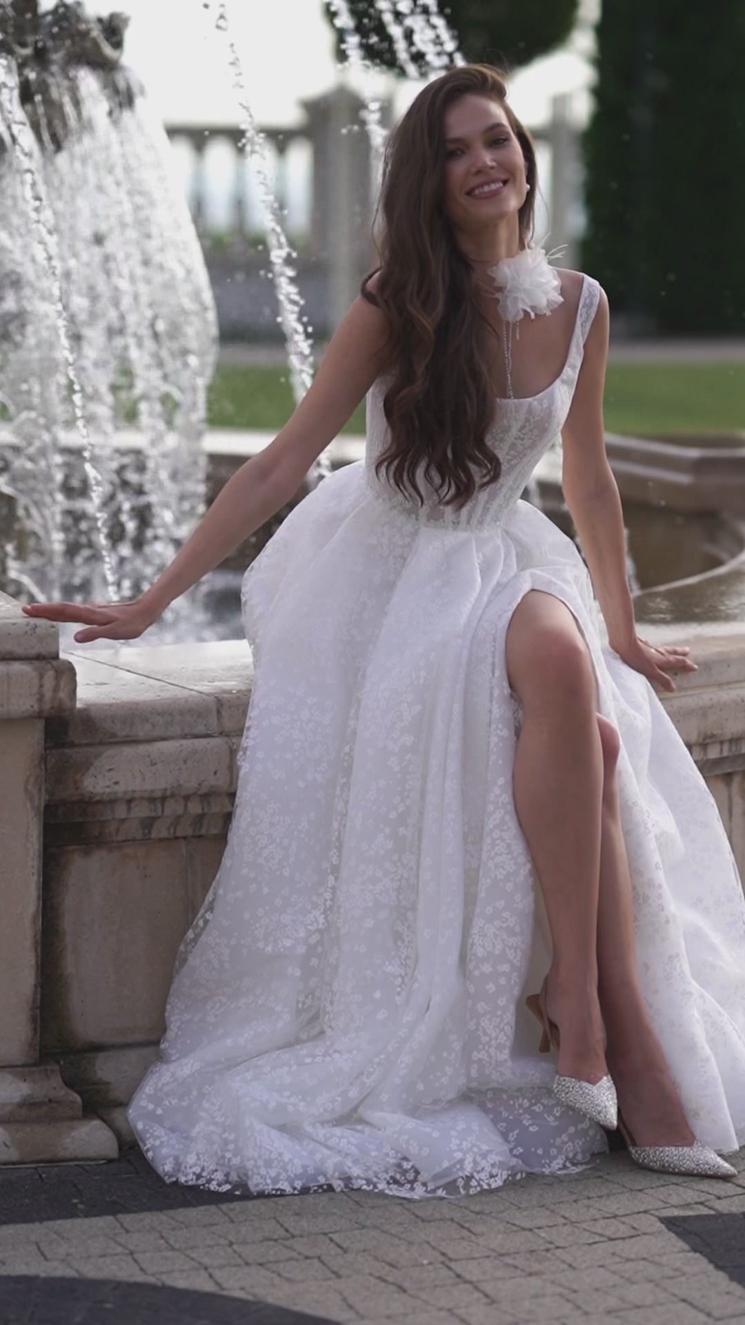 A-line wedding dress with boat neckline and scoop open back.