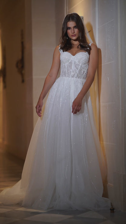 A-line wedding dress with sweetheart neckline & chapel train