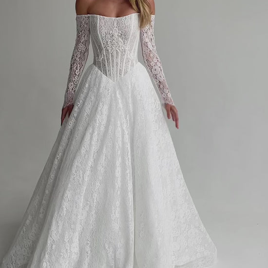 Video: full-length lace A-line wedding dress with an off-shoulder neckline