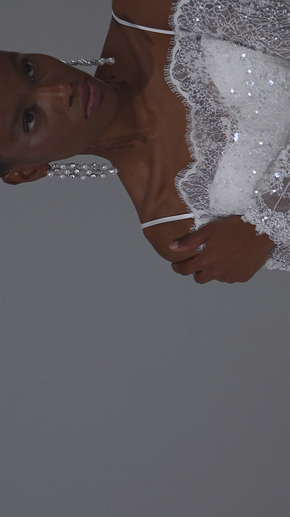 Off-shoulder lace mermaid wedding dress with long sleeves – video