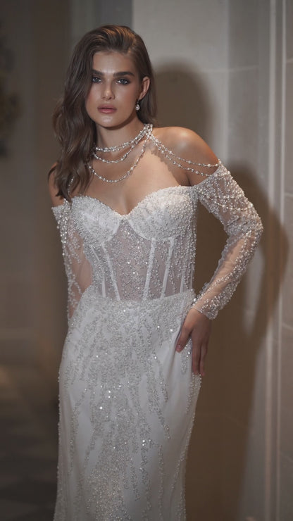 Mermaid trumpet wedding dress with illusion sleeves and lace