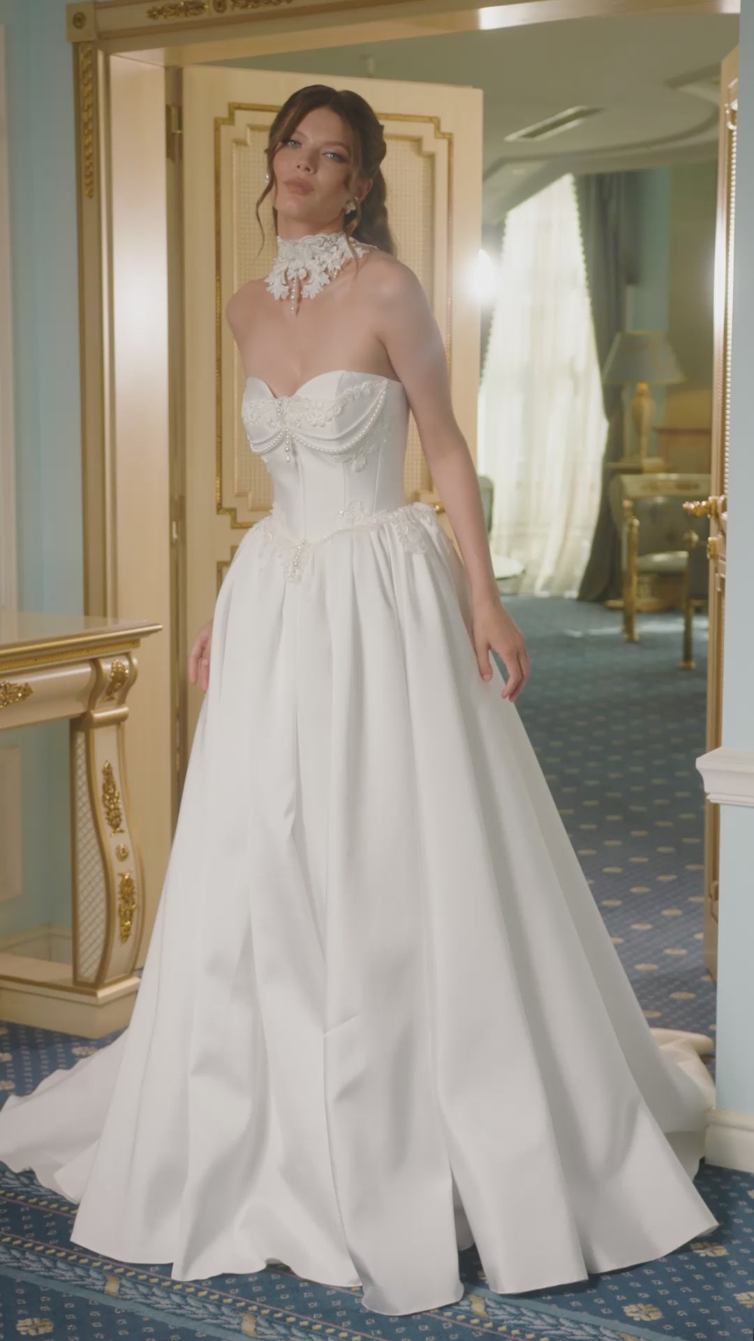 Strapless Mikado princess A-line wedding dress with sweetheart neckline, lace and pearl choker, lace-up closure, and chapel train.