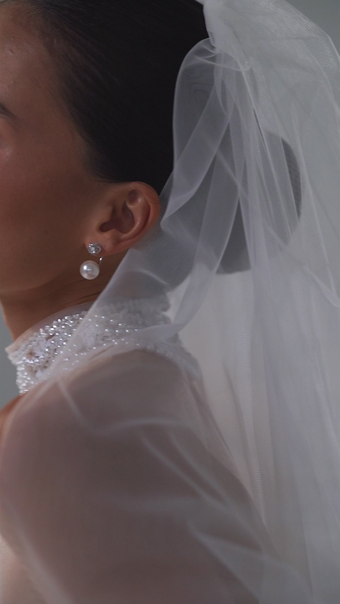 Lace mini wedding dress with corset bodice, sweetheart neckline and detachable tulle train – video