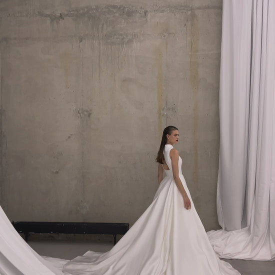 Minimalist halter neckline A-line wedding dress with chapel train