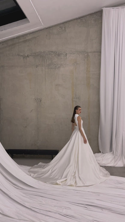 Minimalist halter neckline A-line wedding dress with chapel train