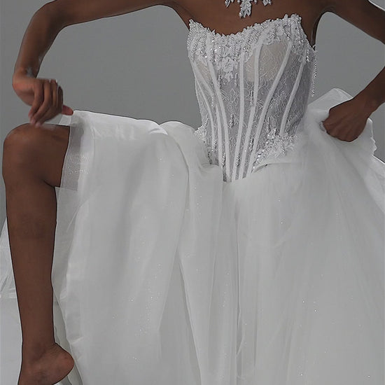 Tulle ball gown wedding dress with strapless lace corset and lace choker – video
