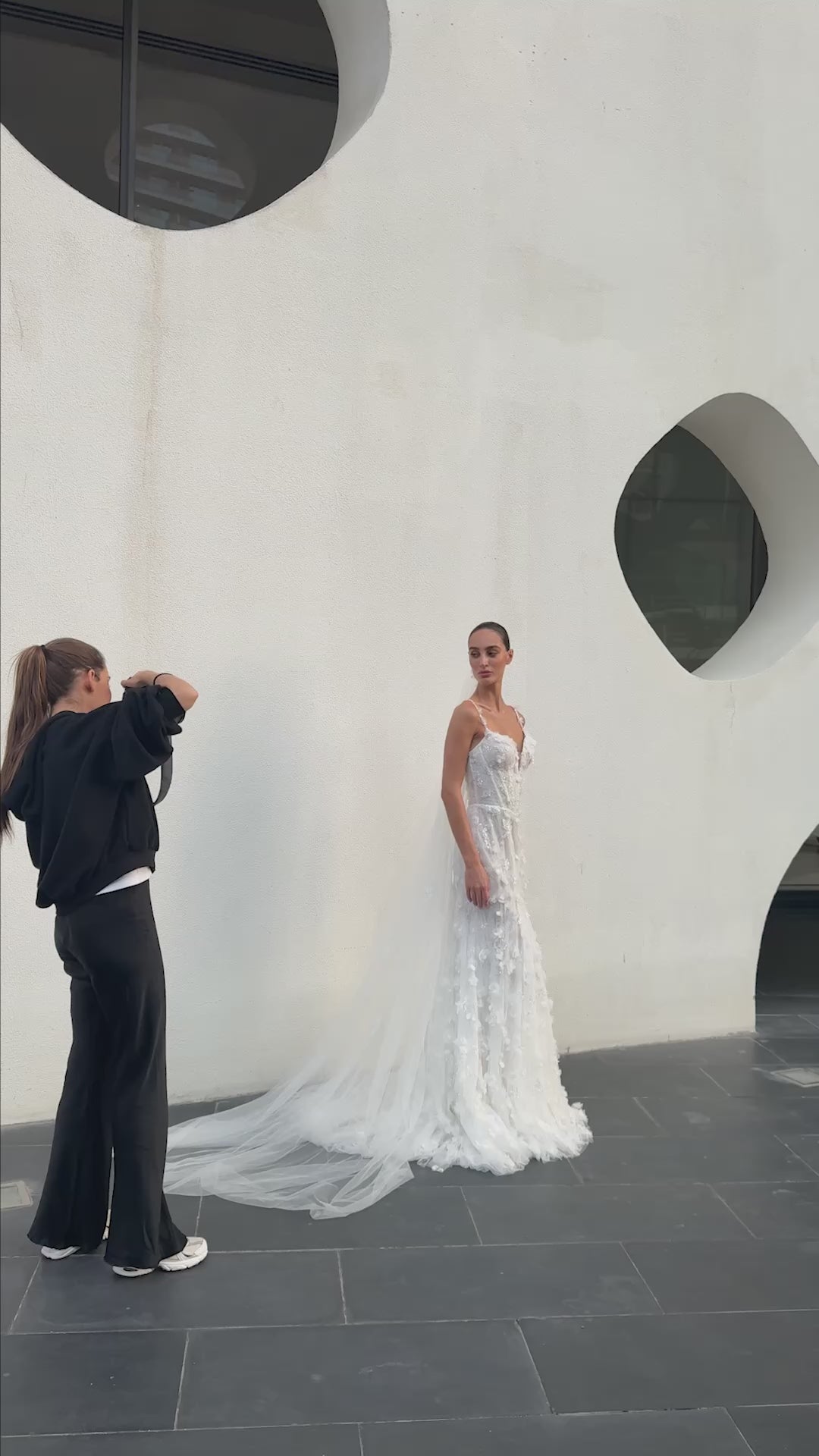 Bride wearing the Capri lace and tulle mermaid wedding gown from the Celeste Collection.