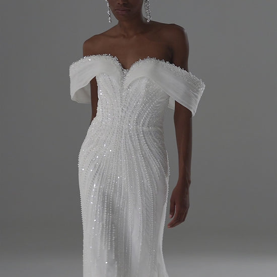 Lace mermaid wedding dress with off-shoulder draped neckline – video