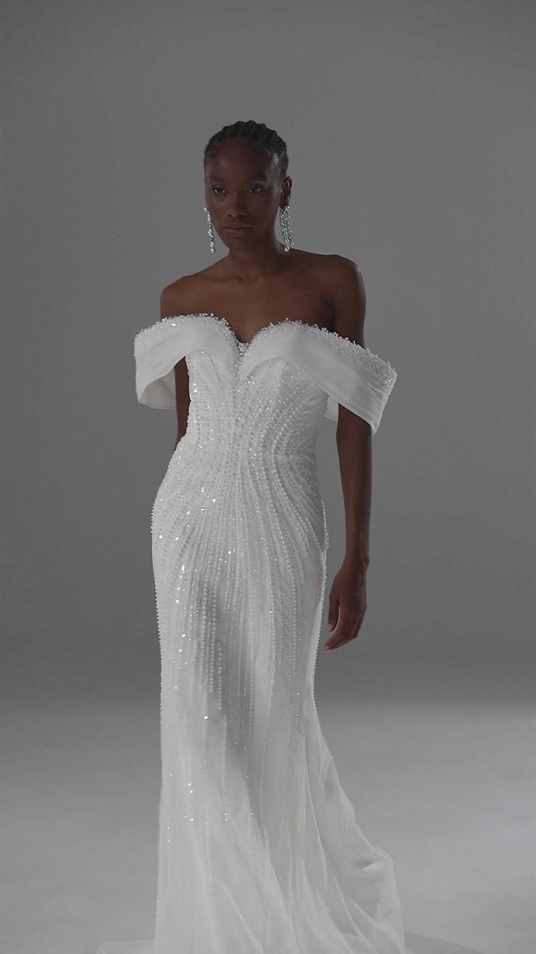 Lace mermaid wedding dress with off-shoulder draped neckline – video