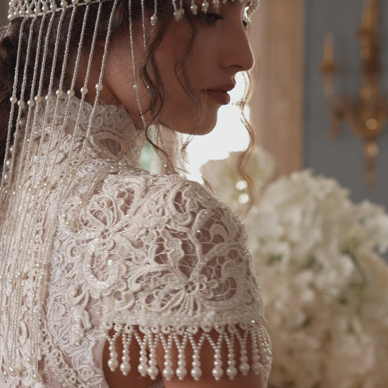 Lace mini wedding dress with high neck, cap sleeves and pearl fringe – video