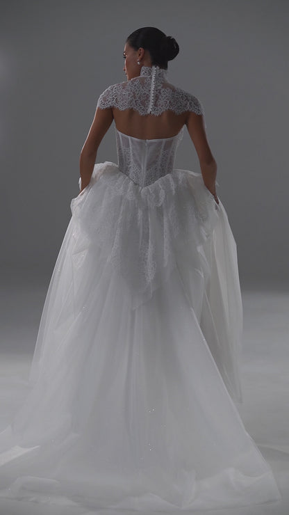 Tulle wedding dress with lace corset bodice, peplum frill and high-neck bolero – video