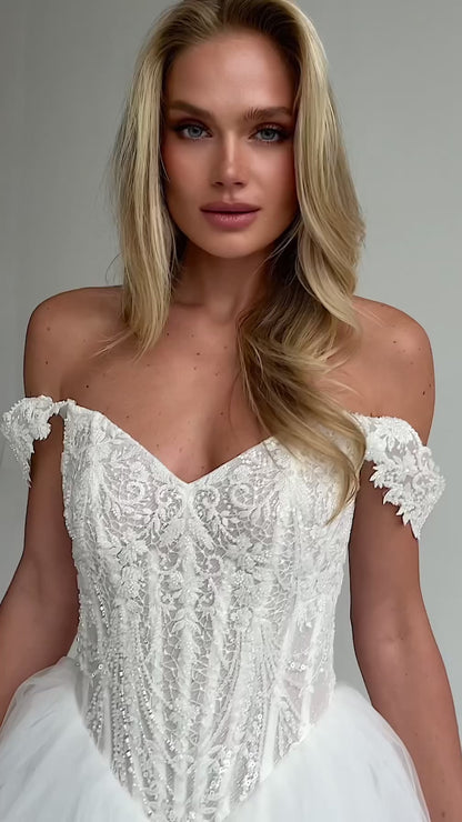 Video: close-up of an off-shoulder beaded lace sweetheart bodice
