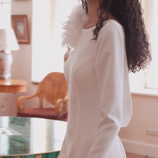 long sleeve crepe wedding dress with floral shoulder and open lace back