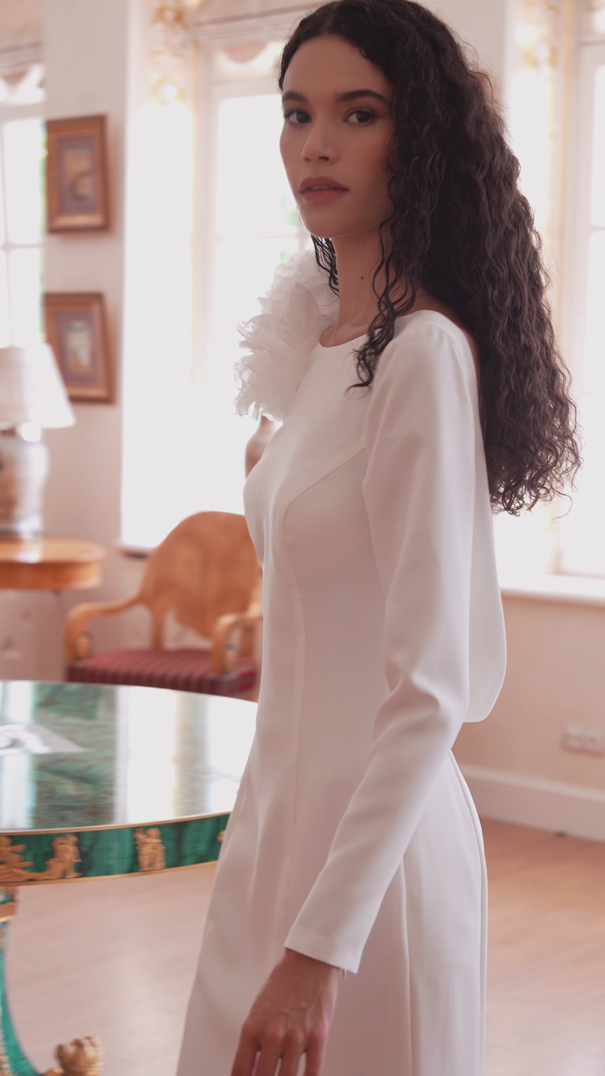 long sleeve crepe wedding dress with floral shoulder and open lace back