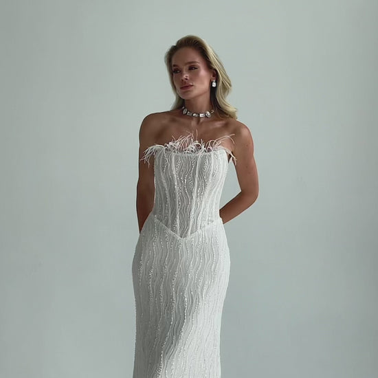 Video: full-length sequin lace mermaid wedding dress with feather trim