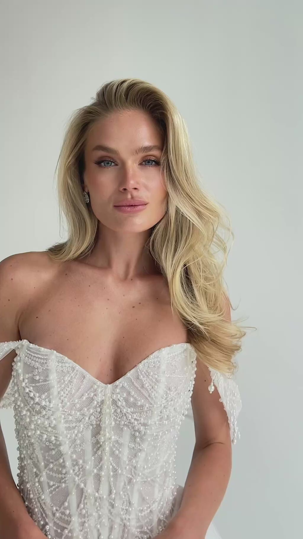 Video: close-up of a beaded sweetheart corset with draped straps