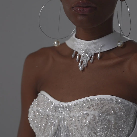 Soft satin mermaid wedding dress with lace corset and peplum waist – video