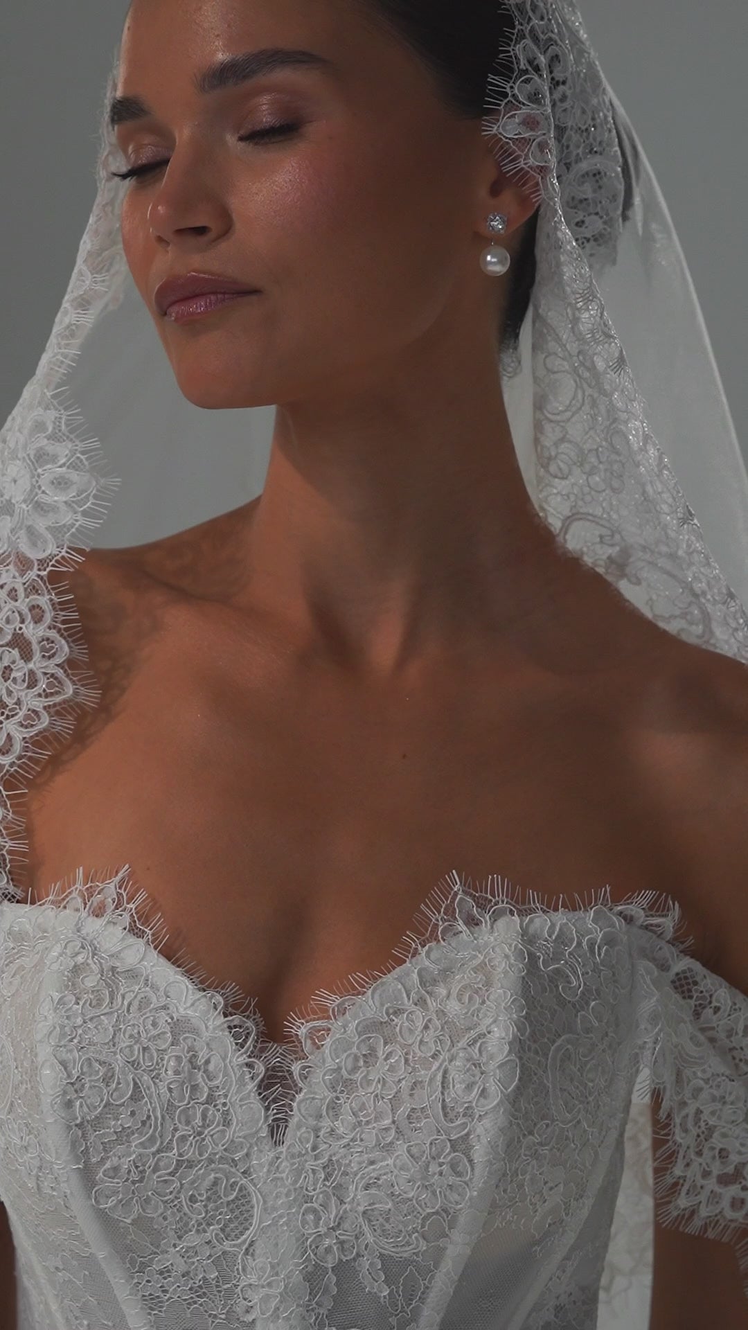 Lace mermaid wedding dress with off-shoulder sweetheart corset and cap sleeves – video