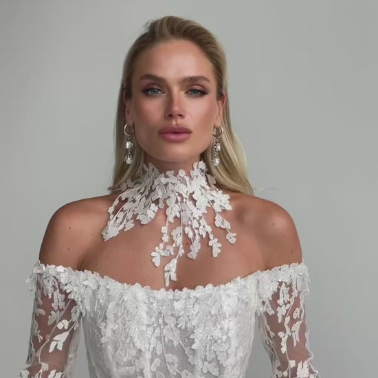 Video: close-up of an off-shoulder lace corset with a floral lace choker collar