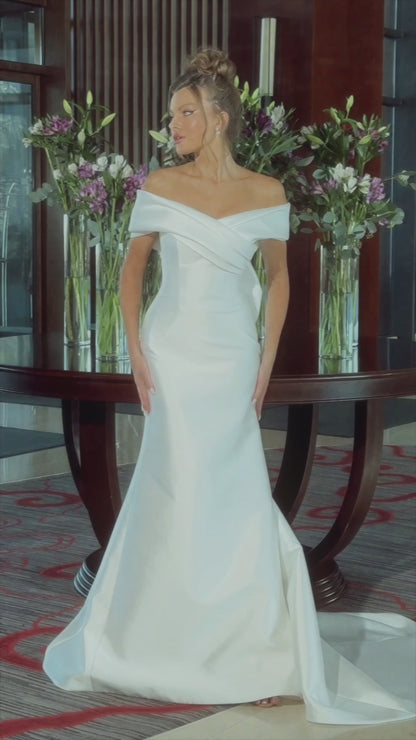Mermaid Mikado wedding dress with fishtail train and bow.