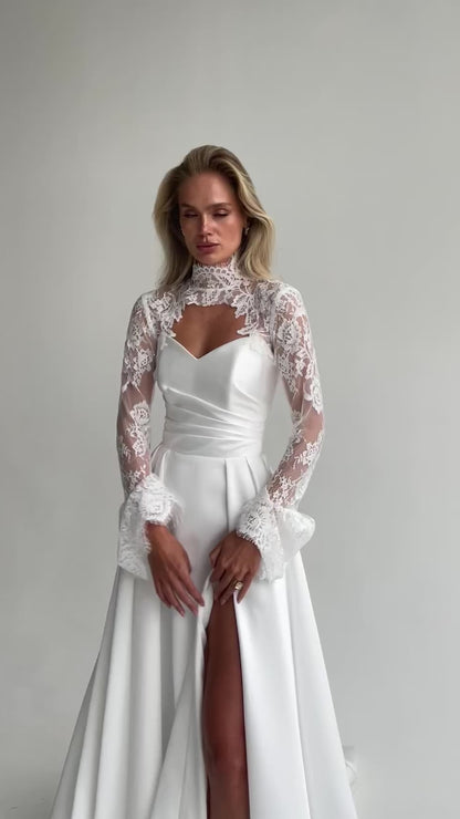 Video: close-up of a sweetheart satin bodice with a lace high-collar bolero and flared lace cuffs