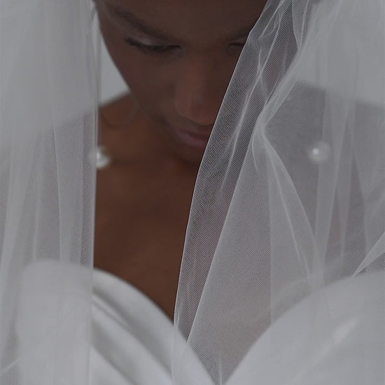 Stretch satin mermaid wedding dress with ruched sweetheart bodice and removable tulle skirt – video