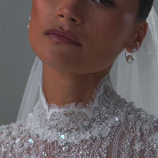 Lace high-neck wedding dress with long sleeves, corset bodice and tulle skirt – video