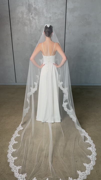 Spanish Mantilla Veil with Lace Trim in Light Ivory - video