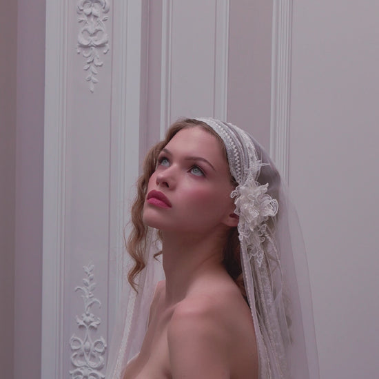 Lace strapless corset wedding gown with basque waist and mermaid-inspired silhouette