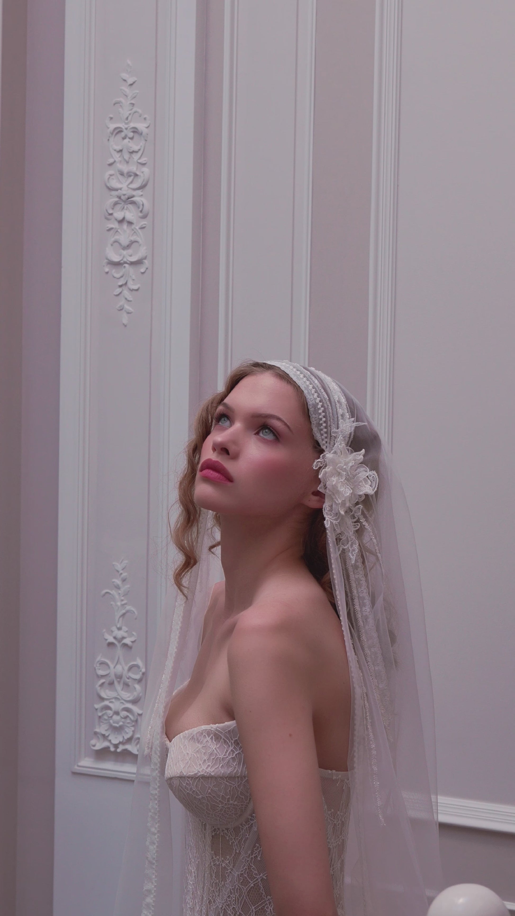 Lace strapless corset wedding gown with basque waist and mermaid-inspired silhouette