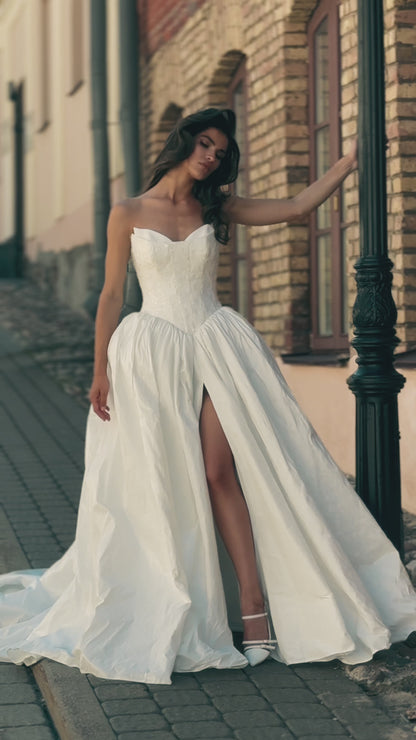 Princess wedding dress with chapel train and lace-up corset