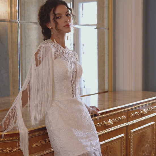 Lace wedding dress with fringe cape sleeves and sheer tulle skirt – video