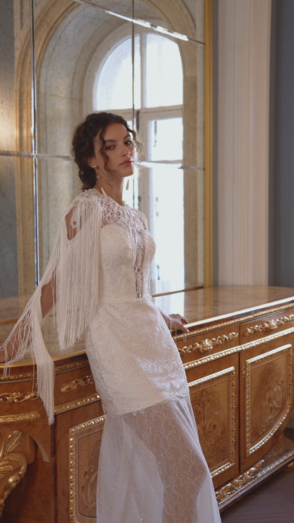 Lace wedding dress with fringe cape sleeves and sheer tulle skirt – video