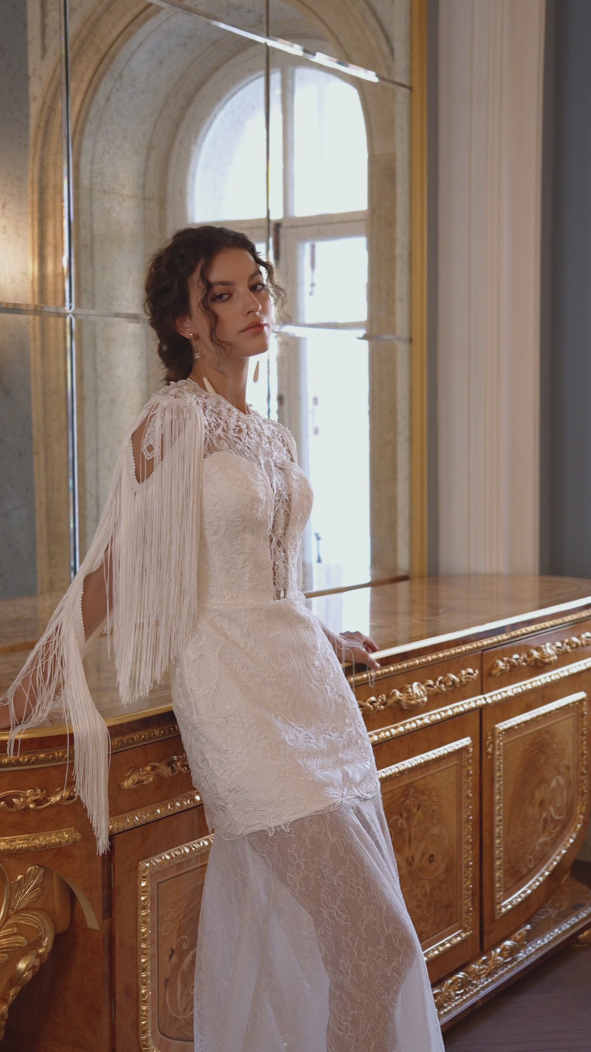 Lace wedding dress with fringe cape sleeves and sheer tulle skirt – video