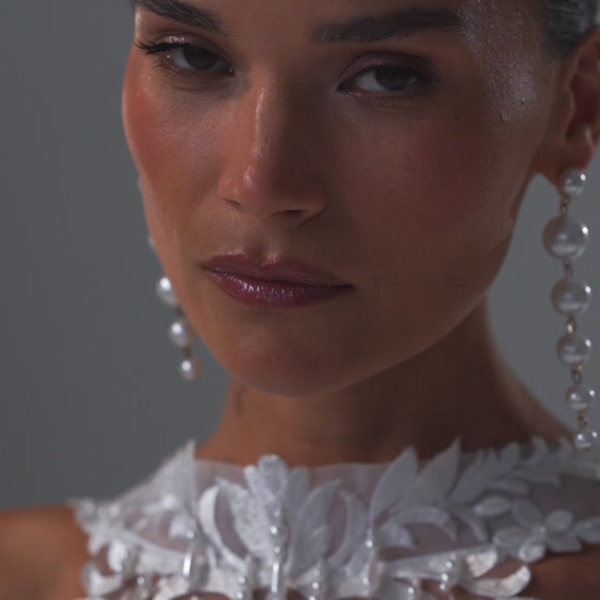 Taffeta ball gown wedding dress with lace corset, high collar and draped bow skirt – video