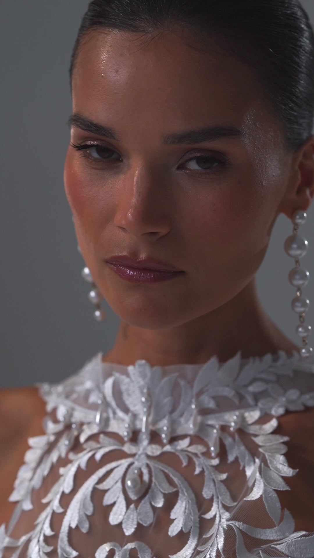 Taffeta ball gown wedding dress with lace corset, high collar and draped bow skirt – video