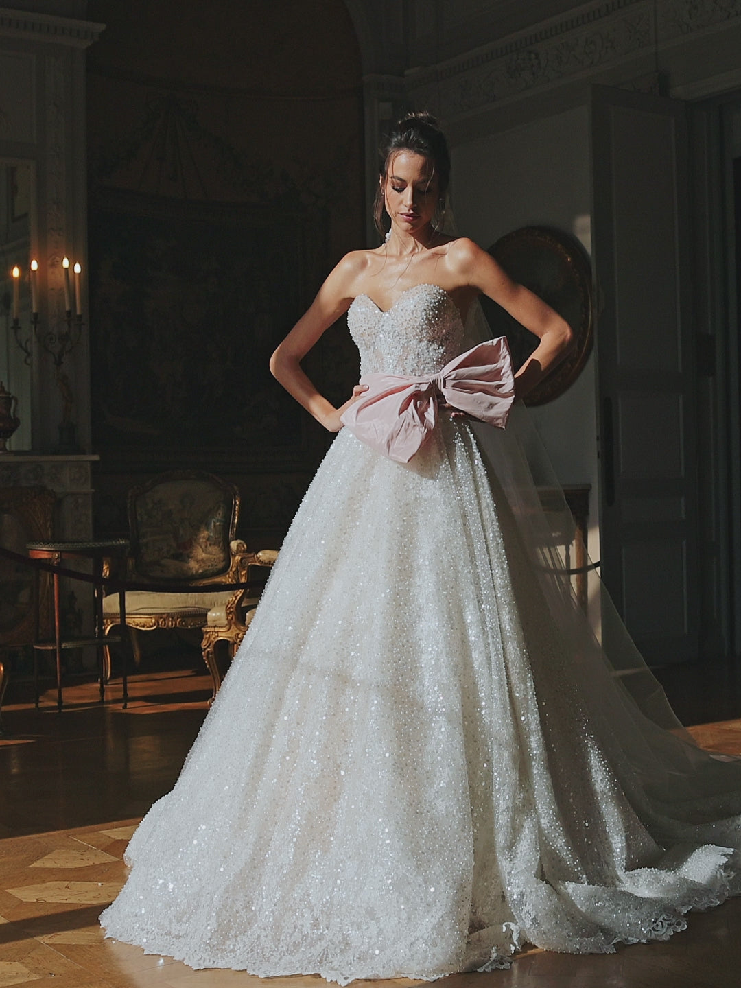 A-line sleeveless wedding dress with blush belt