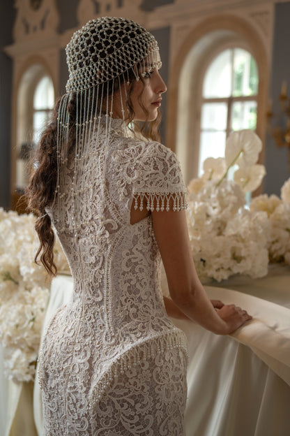 Lace mini wedding dress with pearl fringe – back view with a beaded headpiece