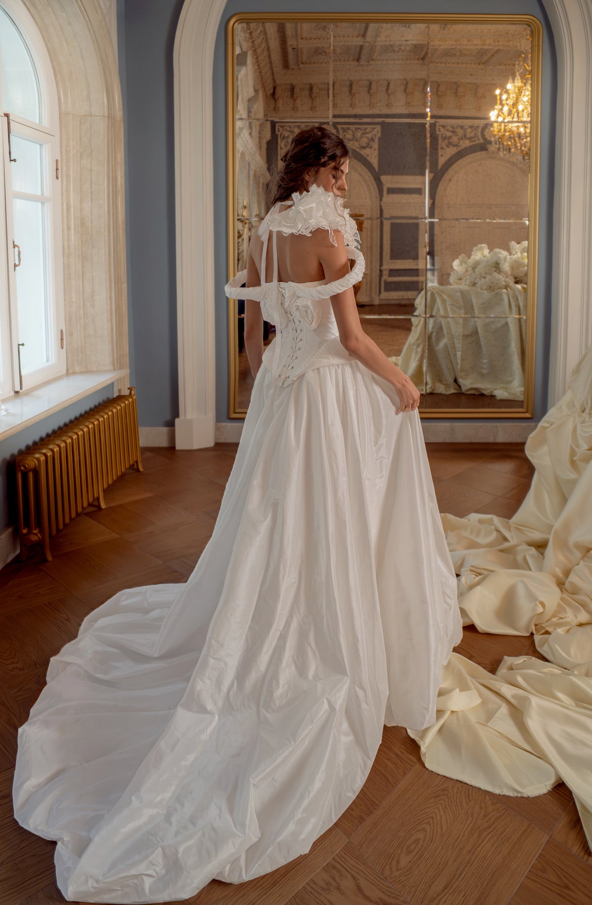 Taffeta ball gown wedding dress with fabric flower – back view of the long train