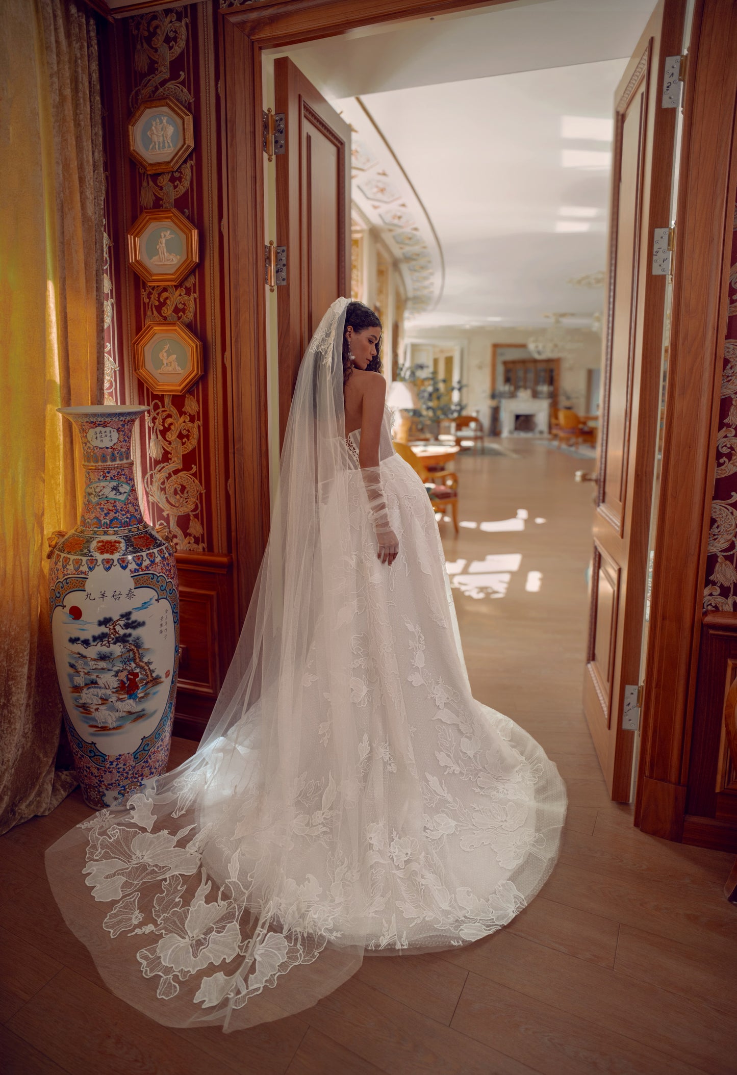 Romantic lace A-line wedding dress with floral appliqué and long tulle train